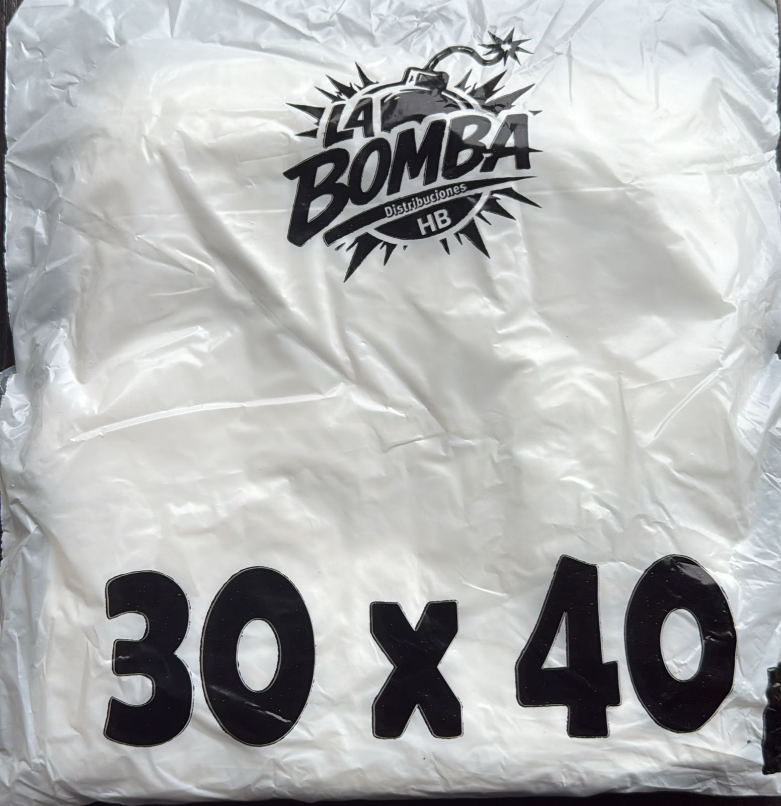 CAMISETA 30X40 LA BOMBA (BLANCA X100U)(20)
